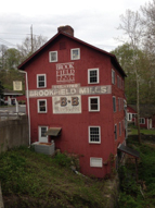 Here is a current picture of the building and signage we wish to refresh.