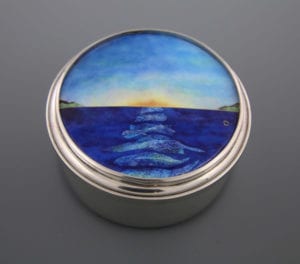 Joanne Conant - Blue Water – Sunrise – Cloisonné and Limoges enamel of water and sunrise. Round pewter box.